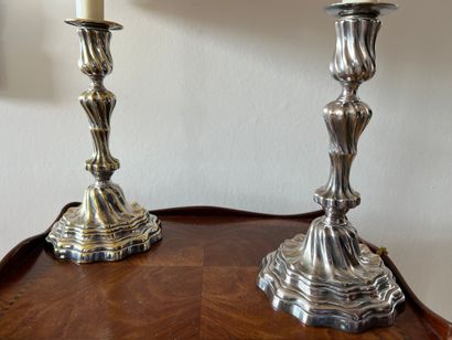 Pair of silver-plated metal torches with...