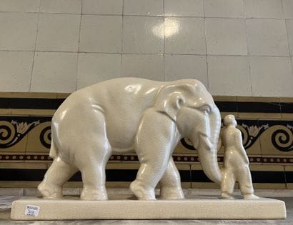 Elephant and his mahout. Group in enamelled...