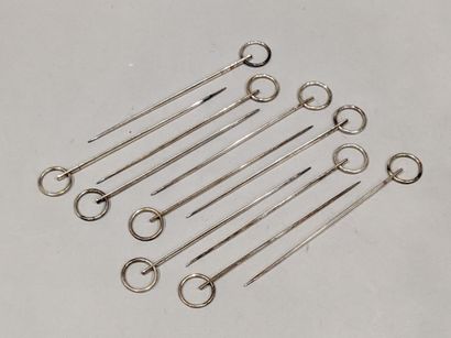 Eleven silver plated metal hasteners.