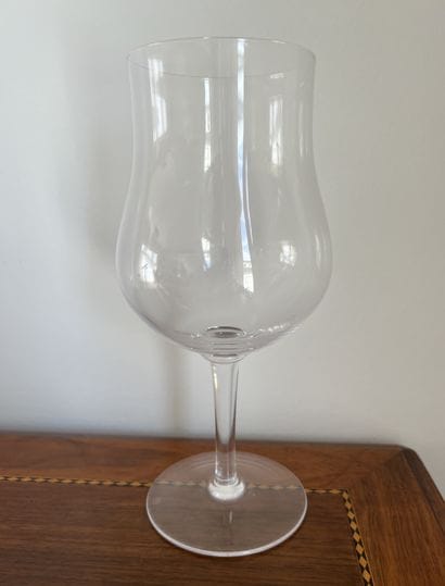 Suite of eight glasses on foot with alcohol...