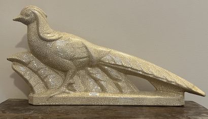 L. FONTINELLE. Pheasant in beige glazed earthenware....