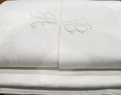 [Set of three white damask cotton tablecloths...