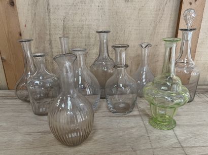 Set of seven glass carafes blown, some godronnées,...
