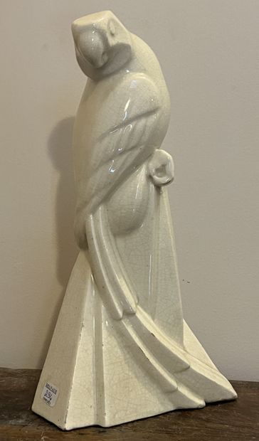 Earthenware of SAINT-CLEMENT. Parrot in enamelled...