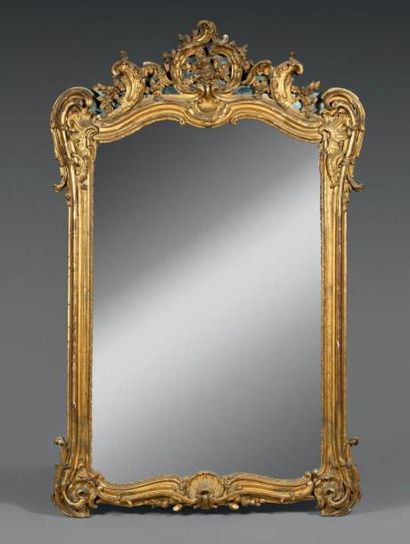 Important miroir en bois redoré, la partie...