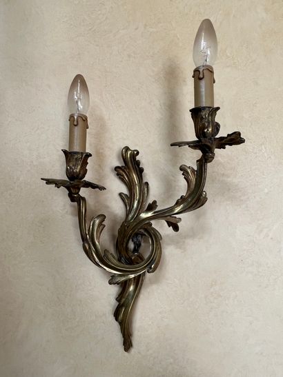 Pair of two-light ormolu sconces with foliage...