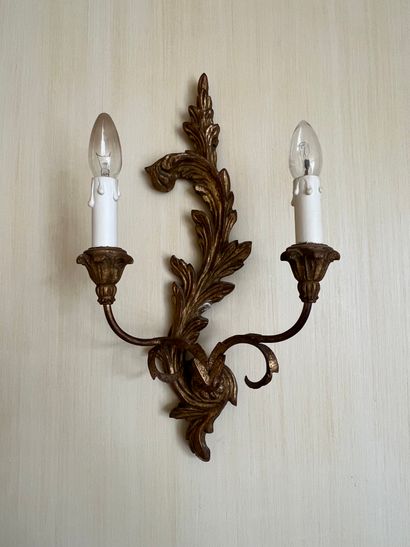 Pair of two-light sconces in patinated gilded...