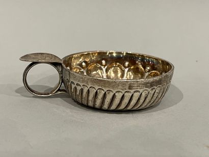 Tastevin in silver (925), the rim decorated...