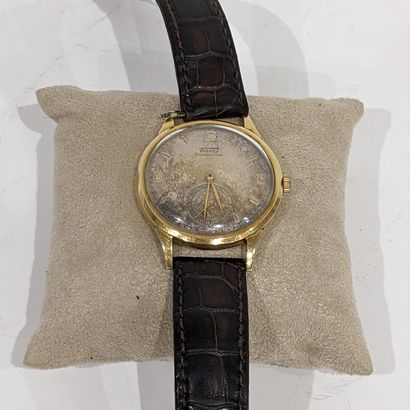 Montre d'homme en or jaune 18K (750), le...