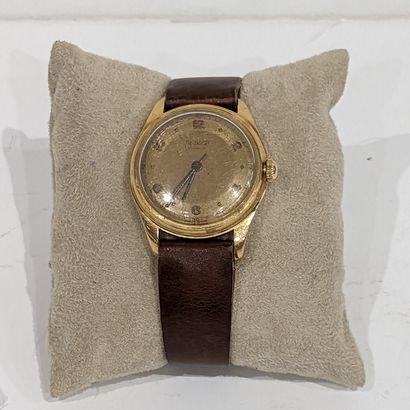 Montre d'homme en or jaune 18K (750), le...