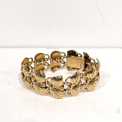 Bracelet en or jaune 18K (750), les anneaux...
