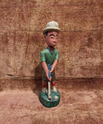 Statuette de colon en bois peint polychrome...