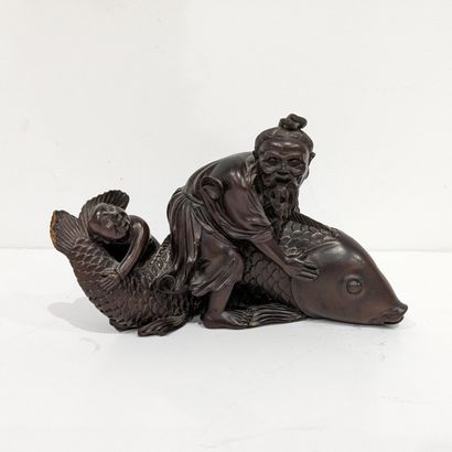 Statuette en bois sculpté représentant le...