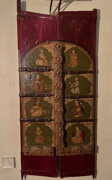 Pair of carved and painted wood shutters,...