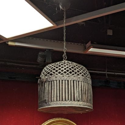 Hanging lamp in patinated metal featuring...