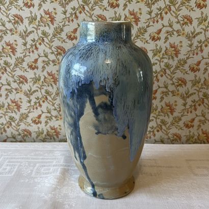 Henri DELCOURT. Earthenware baluster vase...