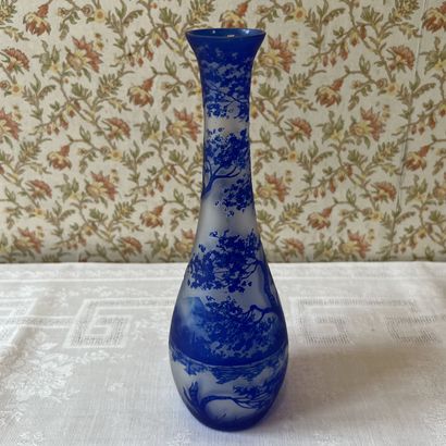 High-necked vase in blue-lined glass, decorated...
