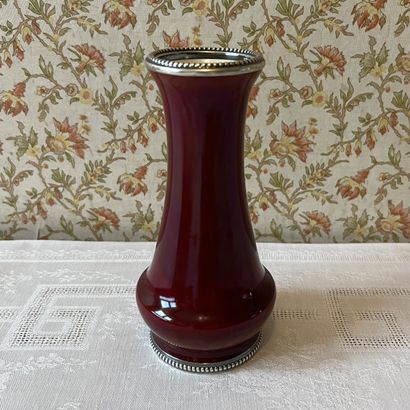 MILLET à Sèvres. Oxblood glazed ceramic baluster...