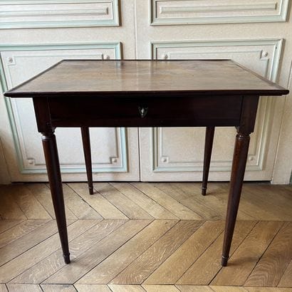 Mahogany table with rectangular cupped top,...