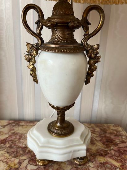 Gilded metal and white marble trim, including...