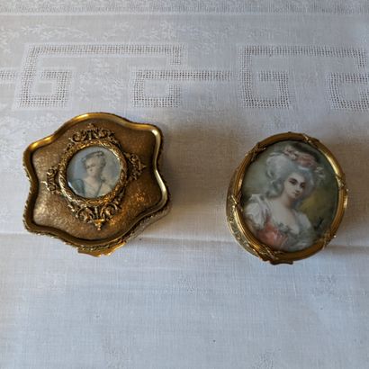 Two brass-mounted boxes with repoussé decoration:...