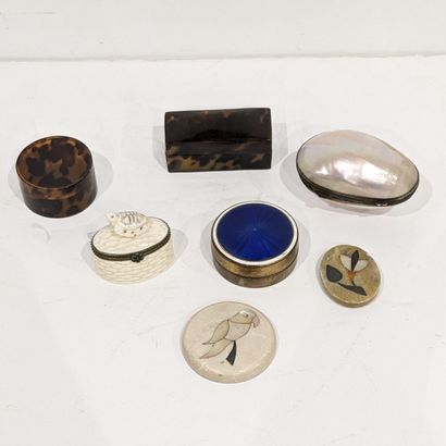 Trinkets: a round brass box, the lid enameled...