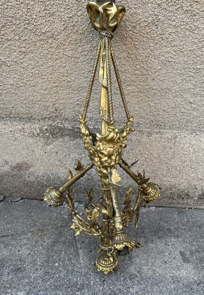 Gilded bronze chandelier. Mounted with three...