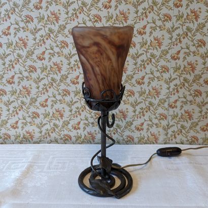 Wrought iron lamp base decorated with scrolls...