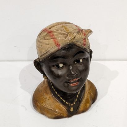 Polychrome terracotta money box featuring...