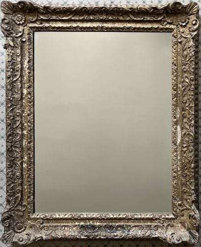Gilded and carved wood frame decorated with...