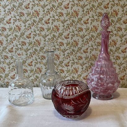 Trinkets: small red lined crystal ball vase...