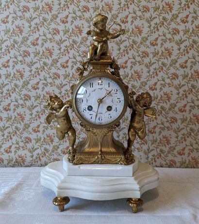 Gilded metal and white marble trim, including...