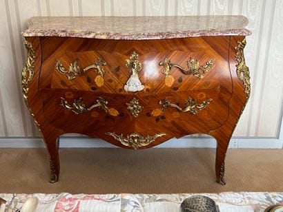 Chest of drawers with curved front and sides...