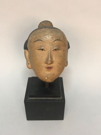 CHINE - Vers 1900. Tête de femme en stuc...