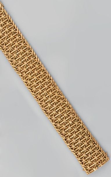 Bracelet paillasson en or jaune à maille...