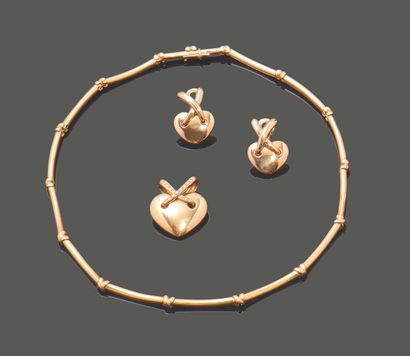 CHAUMET. Parure comprenant : - un tour de...