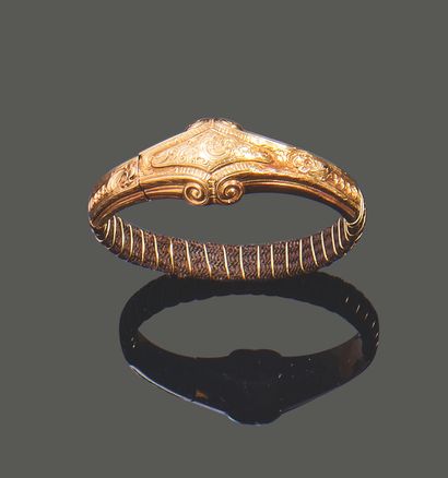 Bracelet jonc ouvrant en or jaune 18K (750)...