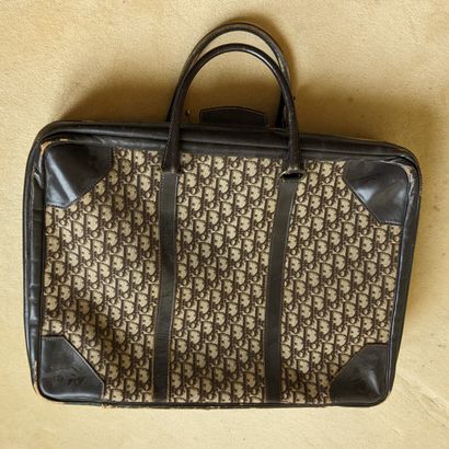 Christian DIOR. Petite valise souple en toile...