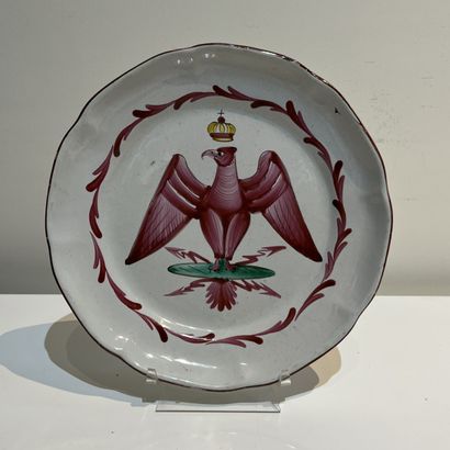 Two Eastern earthenware plates, one with...