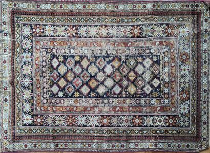 Tapis d'Orient en laine, à décor de petits...