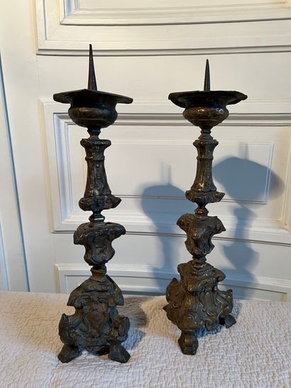 Pair of brass repoussé triangular baluster-shaped...