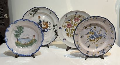 Set of four earthenware dishes with floral...