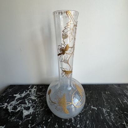 High-necked crystal vase with gilded foliage...