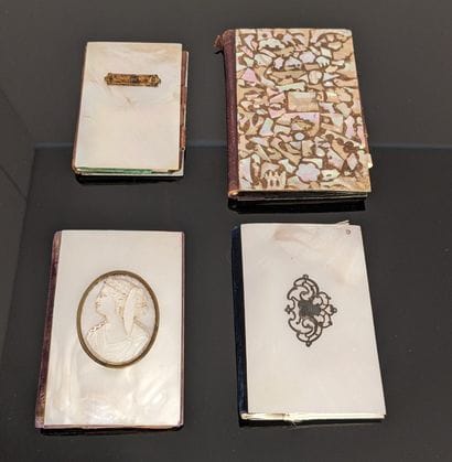 Set of four dance card or notebook covers,...