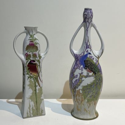 Two porcelain vases with enamel painted decoration...