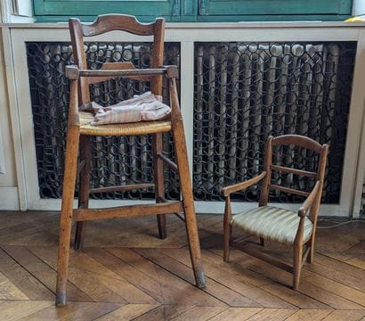 Baby chair in fruitwood. Seat covered with...