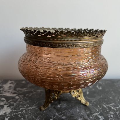 Iridescent glass bowl decorated with a fine...