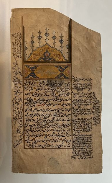 Page de Coran enluminée et rehaussée d'or....