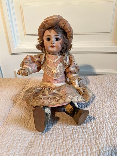 DEP doll. Bisque head, pierced ears, closed...