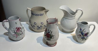 Set of four earthenware brooches with floral...